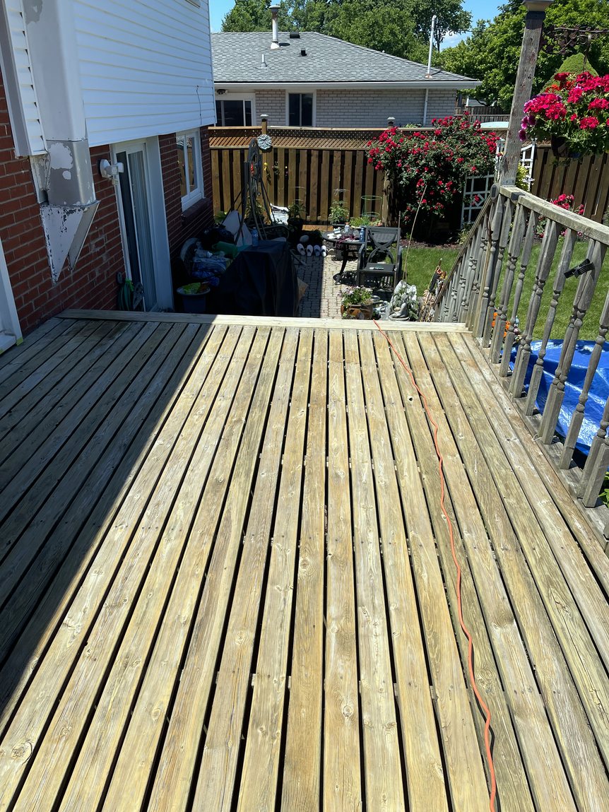 Weathered deck before restoration